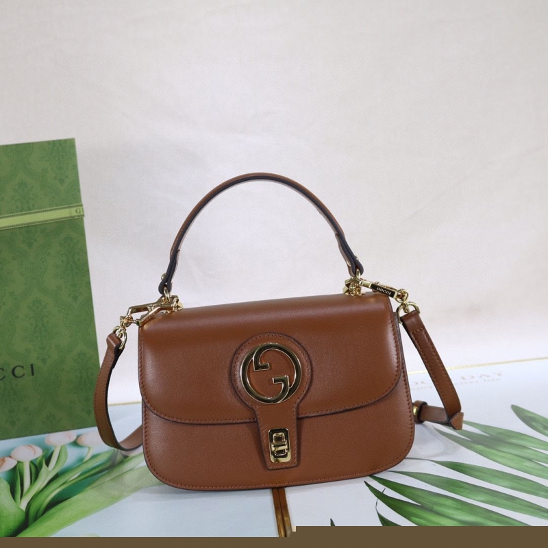 G*u*i top handle bags